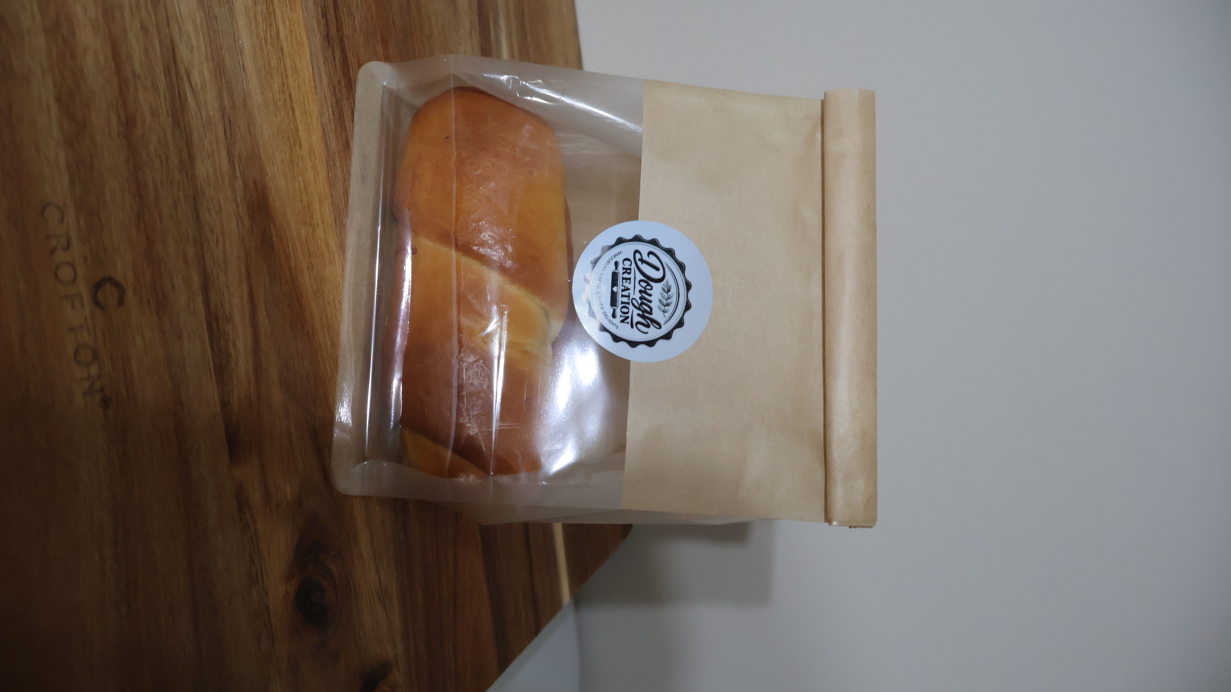 Bolsa de papel con el sello Dough Creation